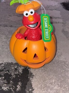 Sesame Street Elmo in Orange Pumpkin with Red Figure